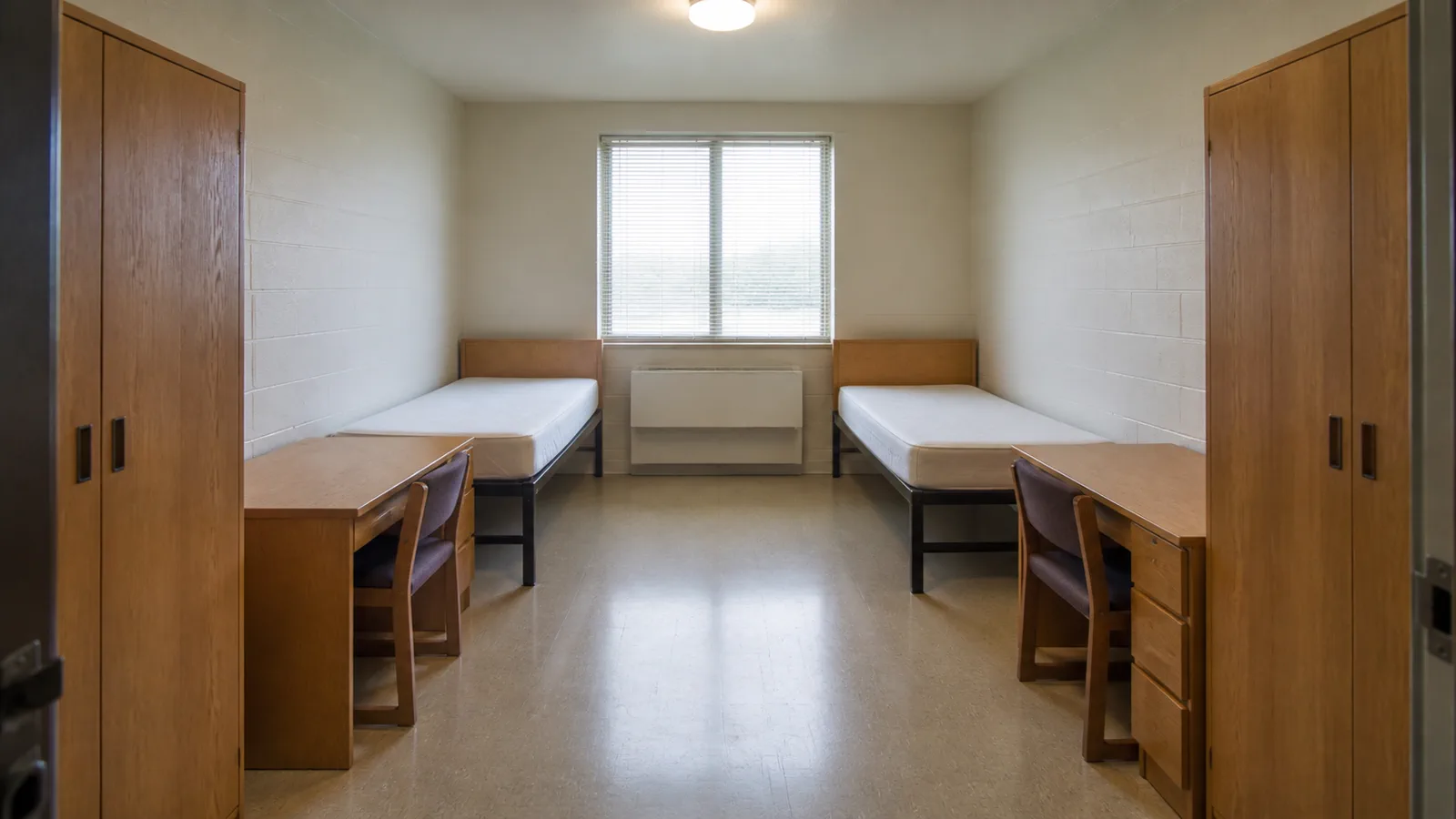 Source: Empty college dorm transformed with removable coastal decor, coordinated bedding and practical storage